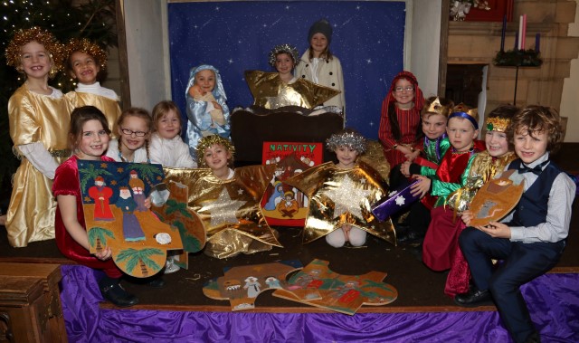 Pupils perform the Magical Christmas Jigsaw 