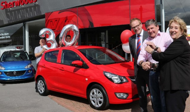 Lucky winner drives off with top prize in charity draw