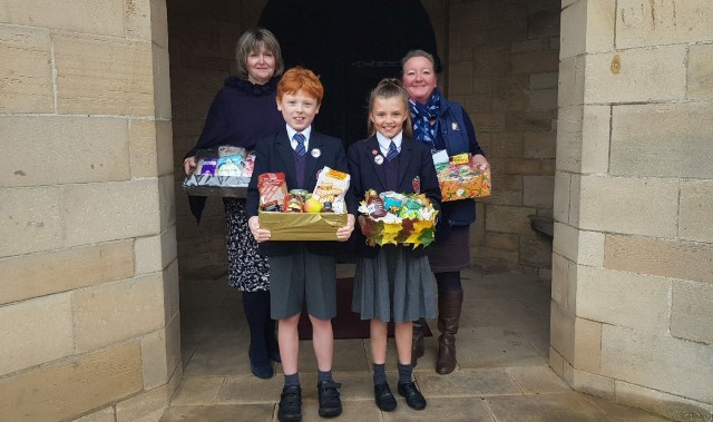 Pupils collect harvest fayre 