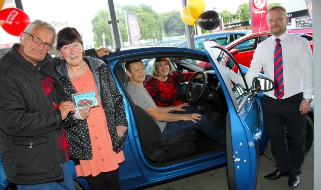Non driver scoops car in charity raffle.