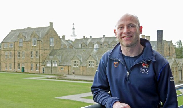 PE teacher raises thousands for charity