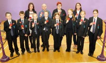 600 poppies are handed to students in special act of worship 