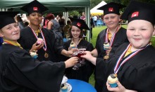 Pupils take part in mini graduation ceremony 