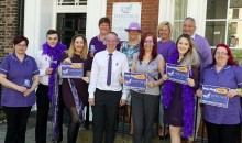 Heritage staff make May purple 