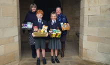 Pupils collect harvest fayre 
