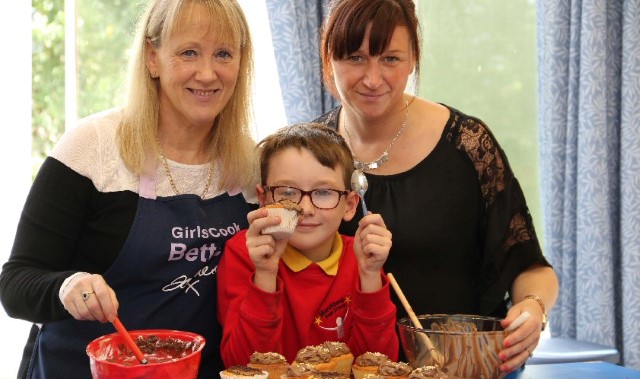 Young bakers create sweet treats for cancer charity