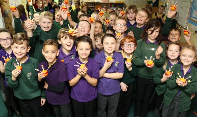 Pupils learn the symbolism of Christingle 