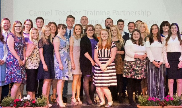 Trainees celebrate their qualified teacher status