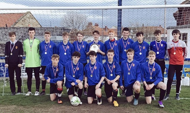Year 11 squad win area and county cups.