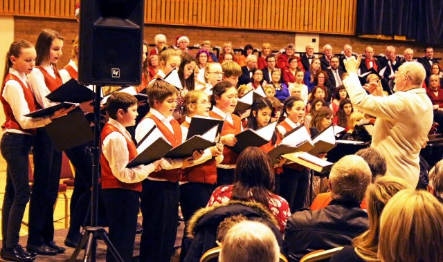 Festive fundraisers flock to concert