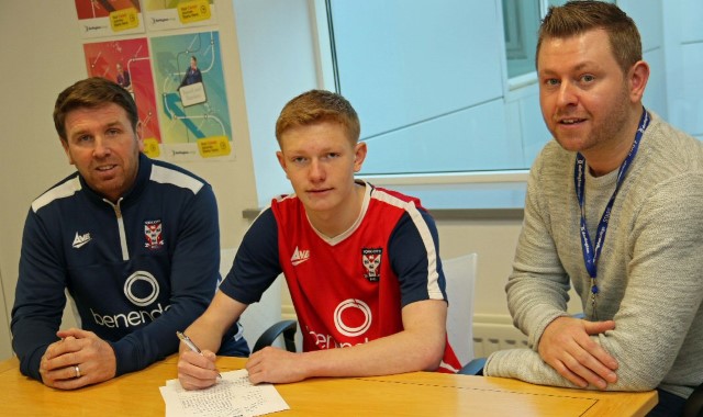 Sports student signs professional contract