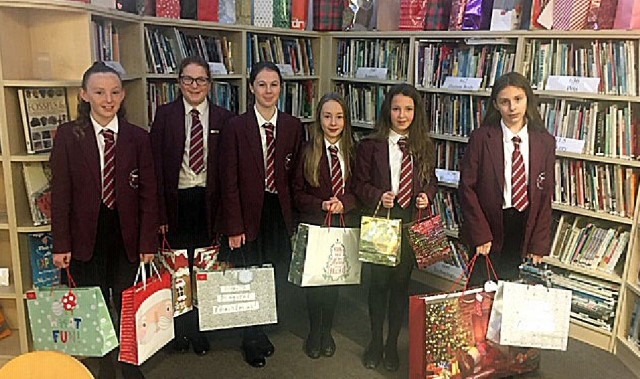 Students bag up treats for Christmas