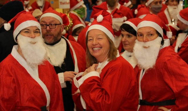 Sea of Santas raise funds for hospice