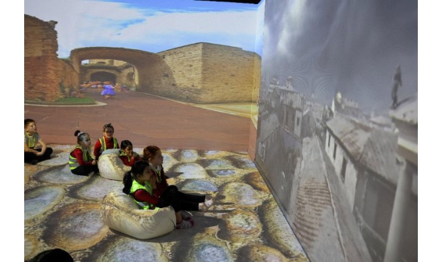 Young learners are transported back through history