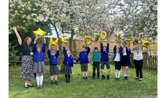 School rewarded with outstanding rating