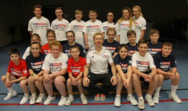 Students take a tumble with a former Olympic gymnast