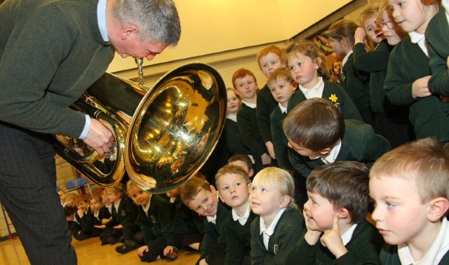 Pupils enjoy movie music and learning in brass class
