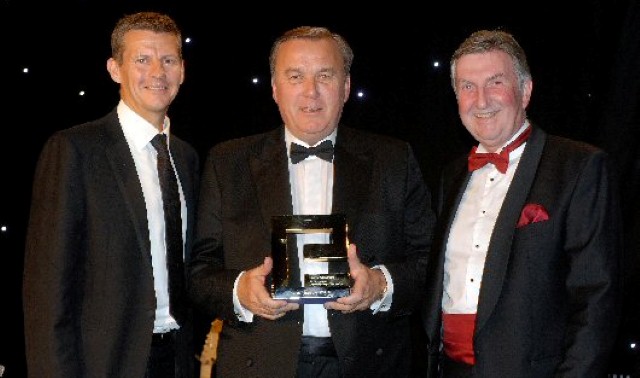 Entrepreneurial icon is presented with lifetime achievement award