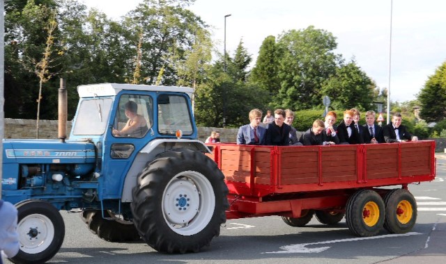 Year 11 students arrive at their leavers ball in style