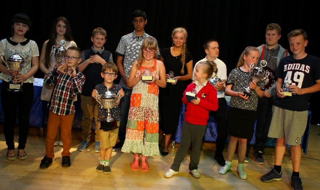 Pupils are presented with schools highest honours Pupils are presented with schools highest honours