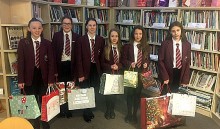 Students bag up treats for Christmas