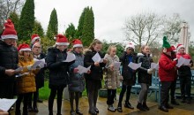 Christmas carollers spread festive cheer 