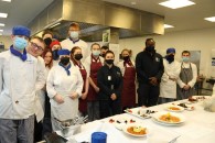Young cooks tutored by Navy chefs