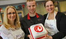 Colossal car showroom cake sale raises cash for charity