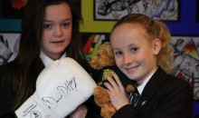World champion's boxing glove is donated to school auction