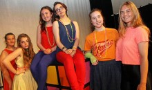 Students turn back the decades with a throwback 80s production.